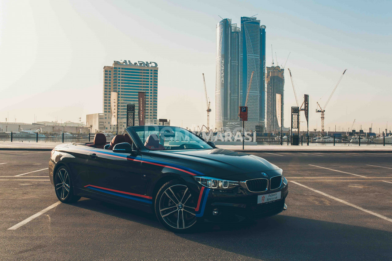 Black BMW 430i Cabrio for rent in Dubai