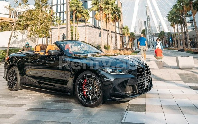 Black BMW 4M Sport Competition cabrio for rent in Dubai