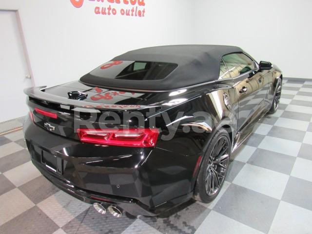 Black Chevrolet Camaro convertible for rent in Sharjah 0