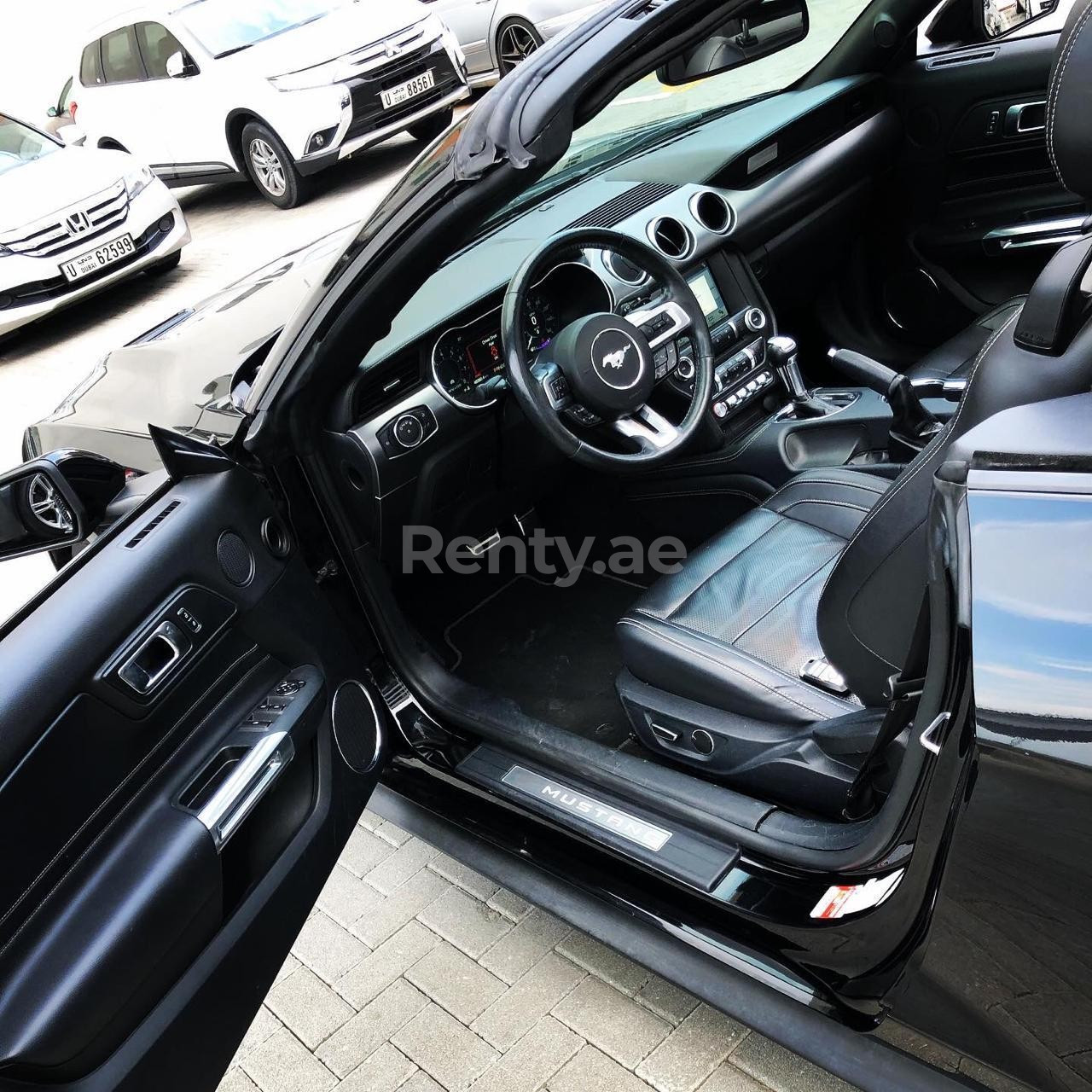 Black Ford Mustang Convertible for rent in Sharjah 3