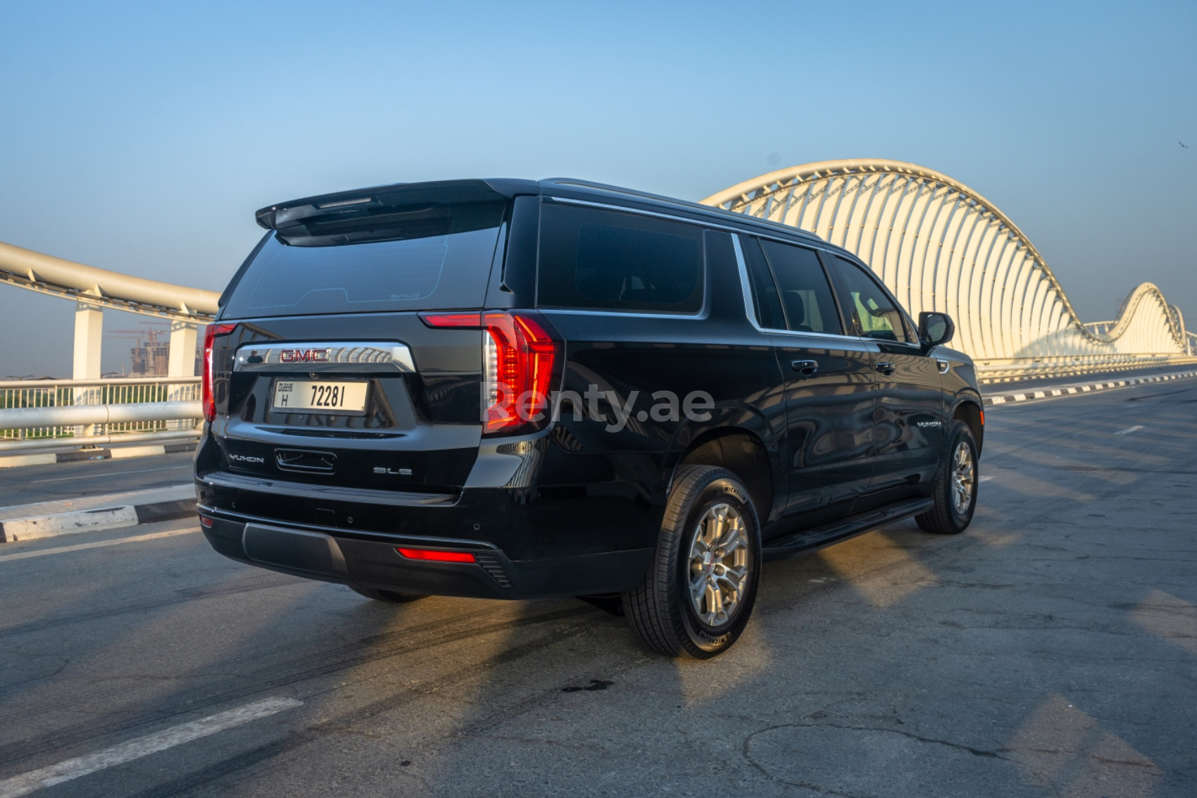 Black GMC Yukon XL for rent in Sharjah 1