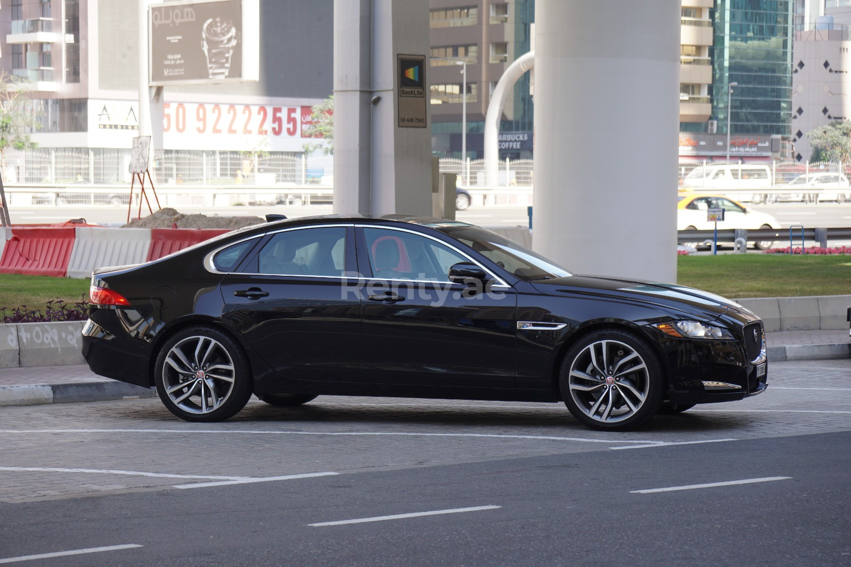 Black Jaguar XF for rent in Abu-Dhabi 3