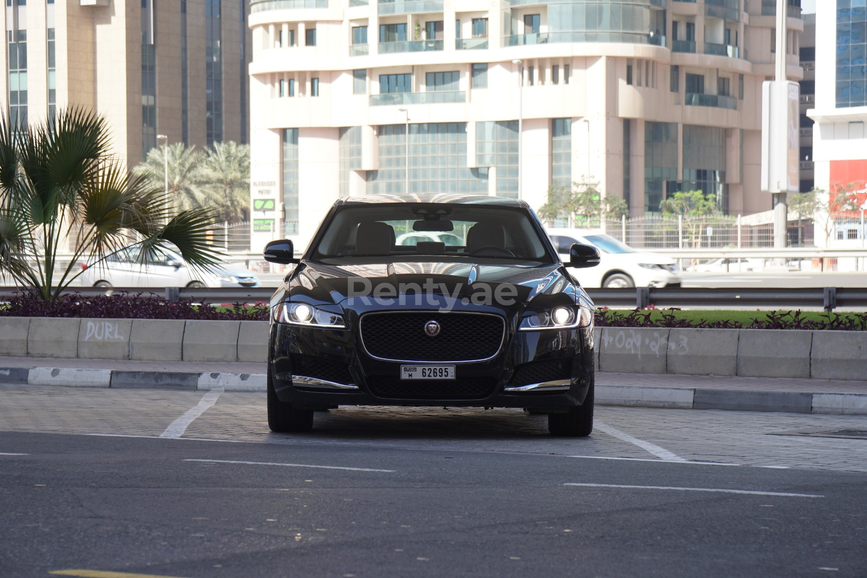 Black Jaguar XF for rent in Dubai 4