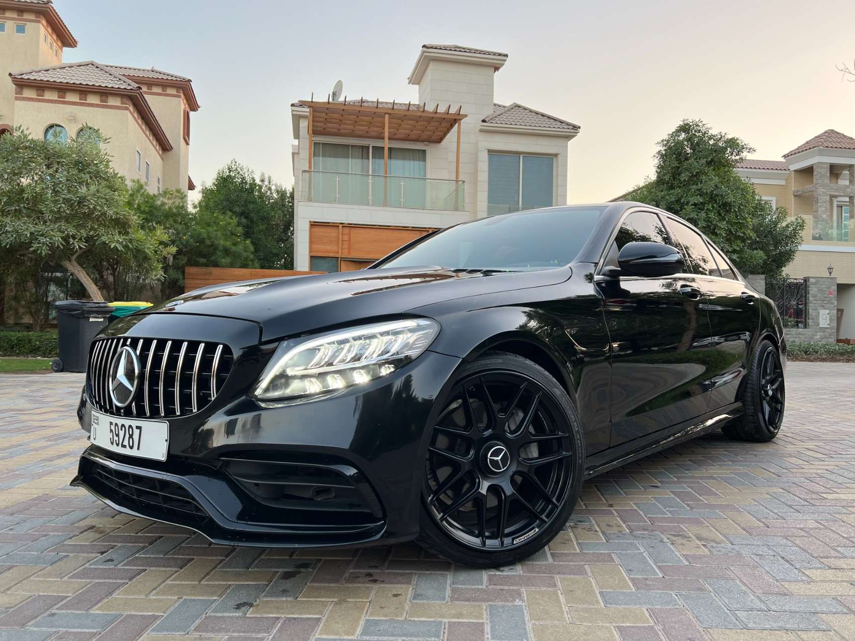 Black Mercedes C300 with C63 Black Edition Bodykit for rent in Sharjah 2