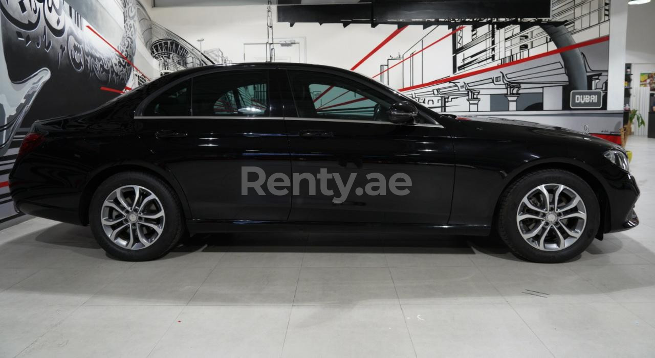 Black Mercedes E 200 for rent in Dubai 0