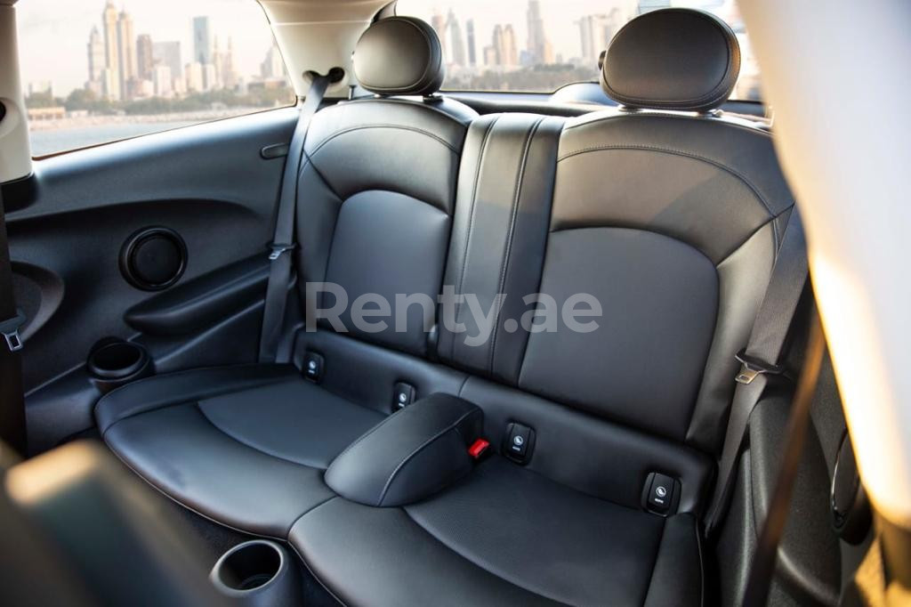 Black Mini Cooper for rent in Dubai 4