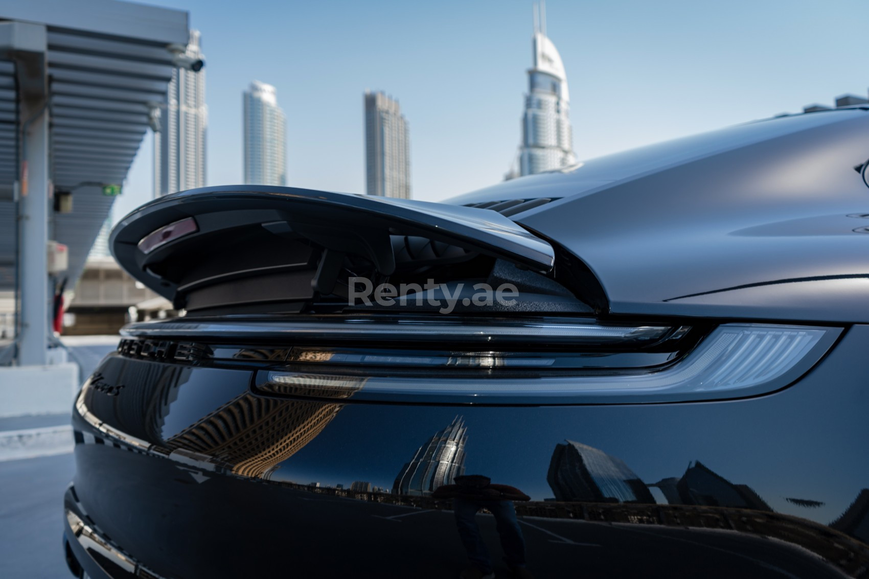 Black Porsche 911 Carrera S for rent in Sharjah 2