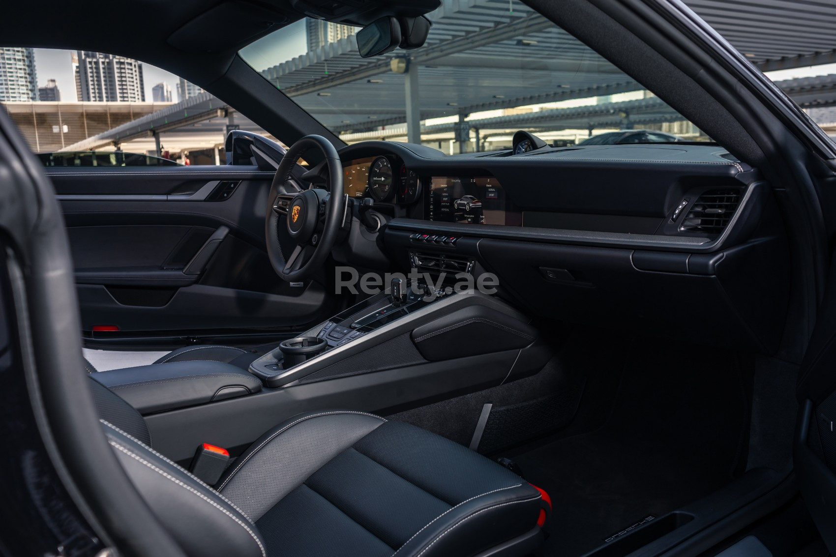 Black Porsche 911 Carrera S for rent in Dubai 6