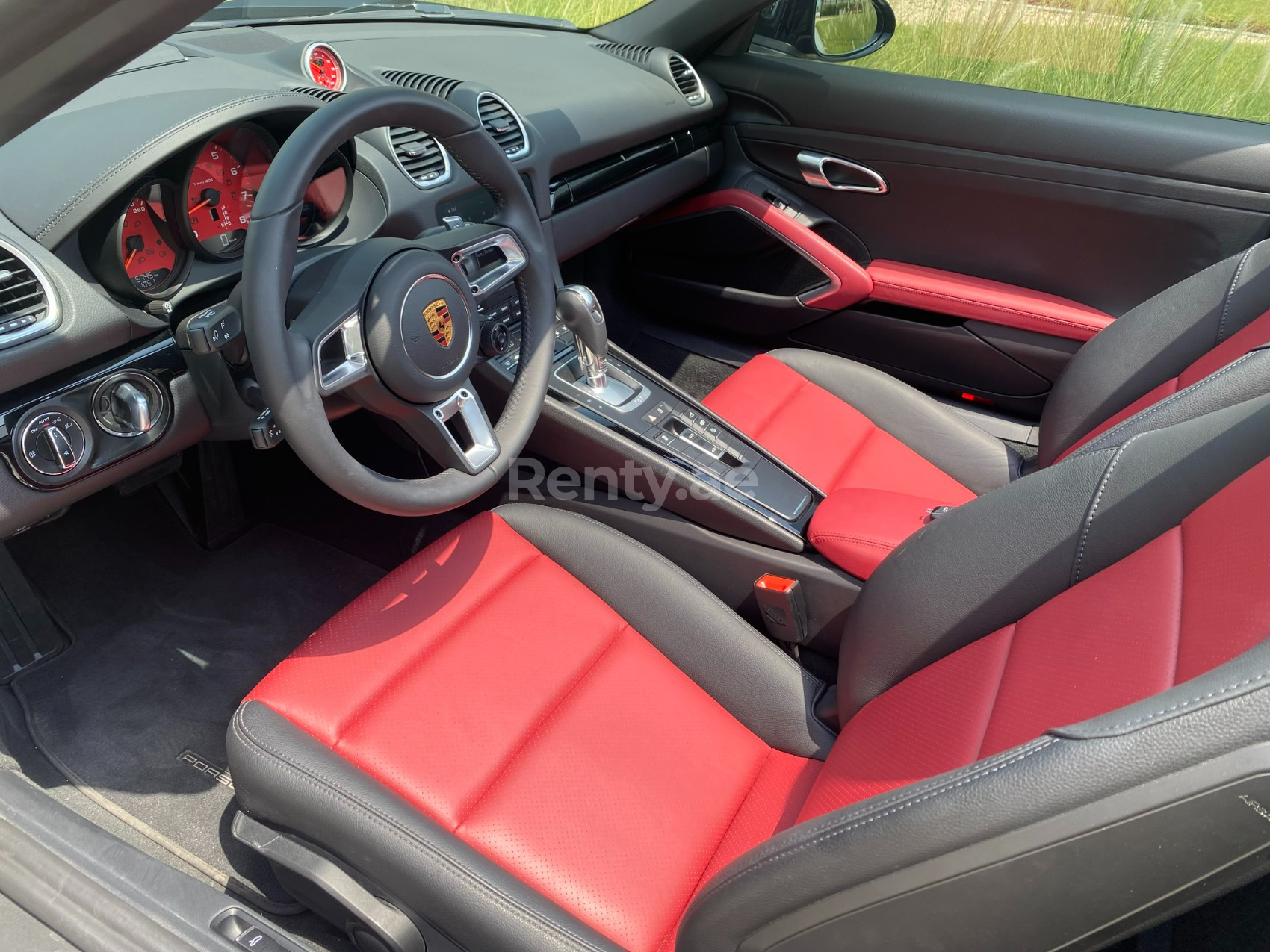 Black Porsche Boxster 718 for rent in Sharjah 3