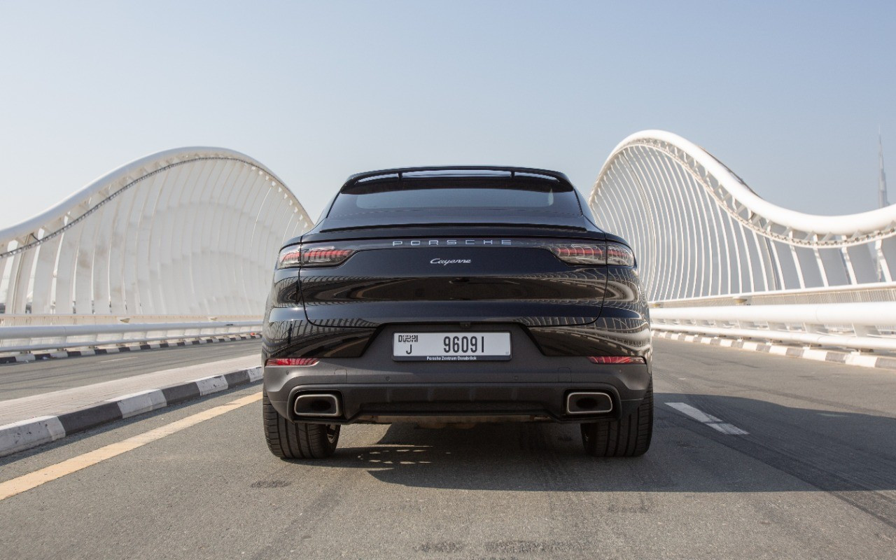 Black Porsche Cayenne coupe for rent in Sharjah 0