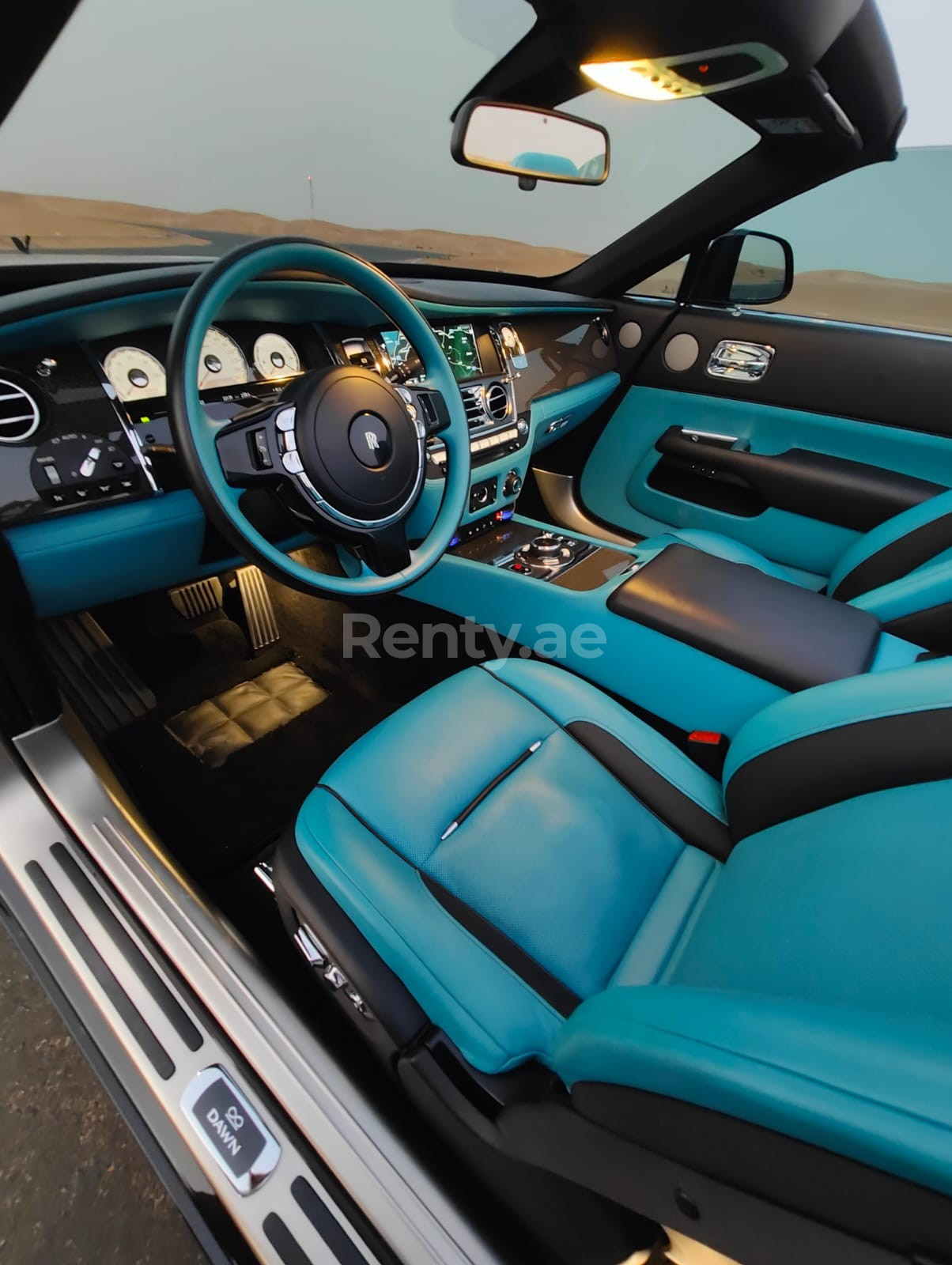 أسود Rolls Royce Dawn للإيجار في أبو ظبي 0