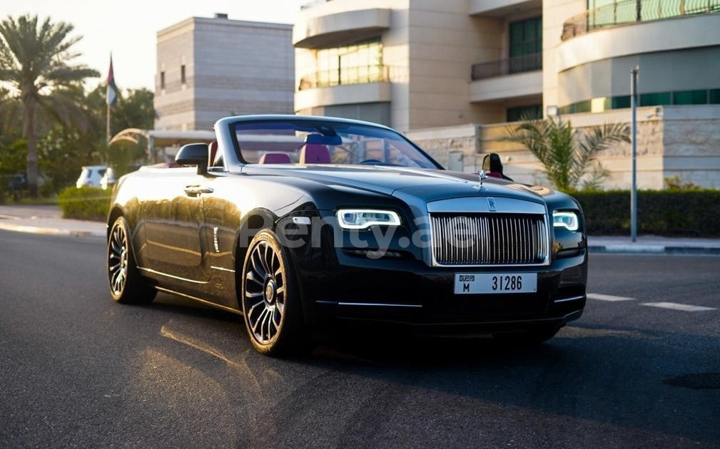 Black Rolls Royce Dawn Black Badge for rent in Dubai