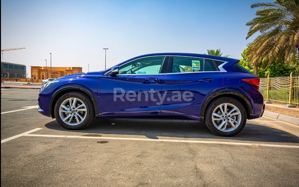 Blue Infiniti Q30 for rent in Dubai