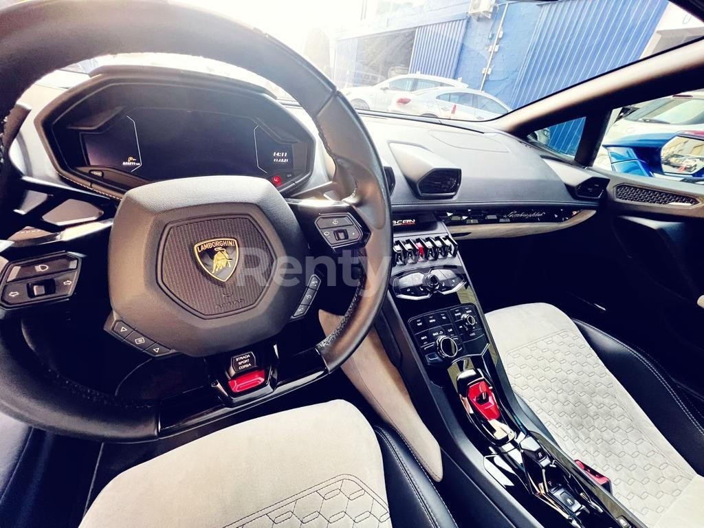 Blue Lamborghini Huracan Spyder for rent in Dubai 2