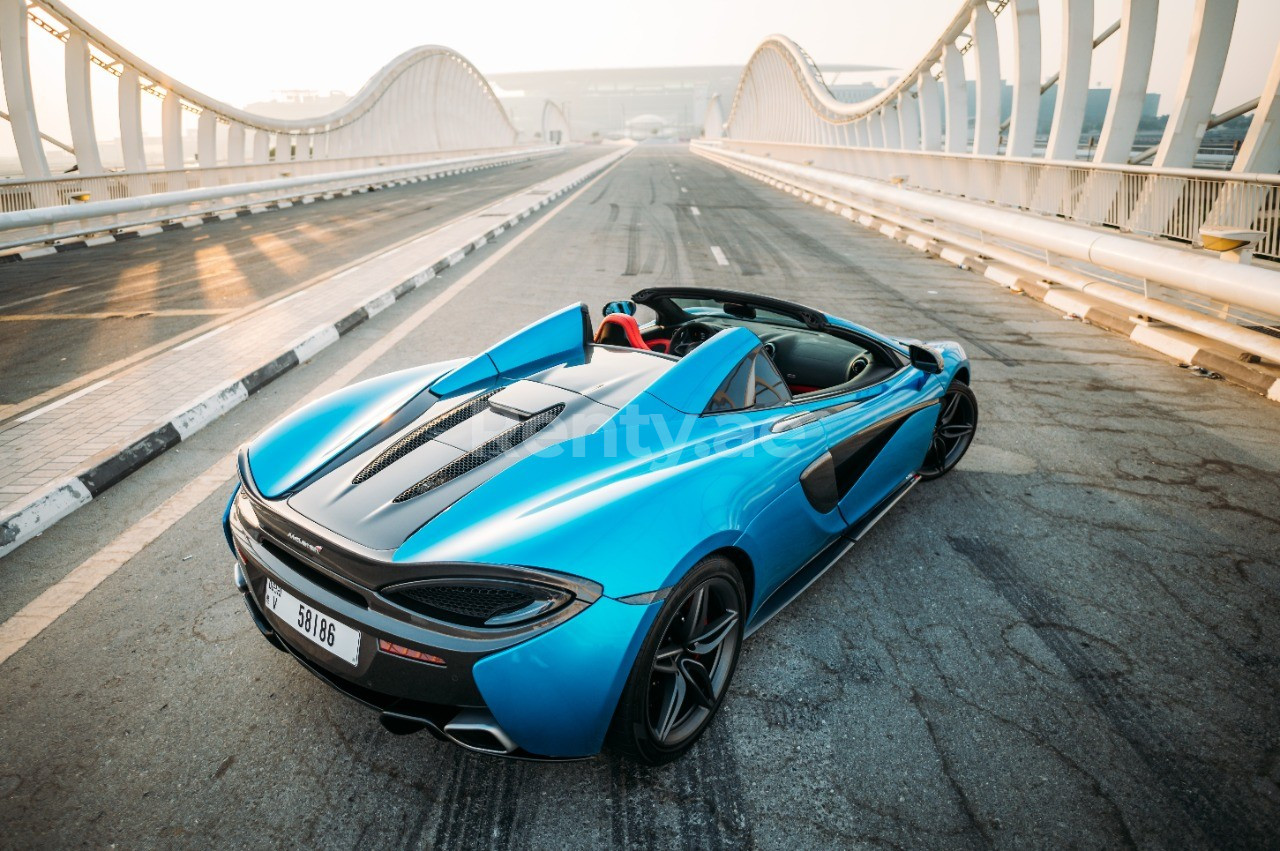 Blue McLaren 570S Spyder for rent in Sharjah 1