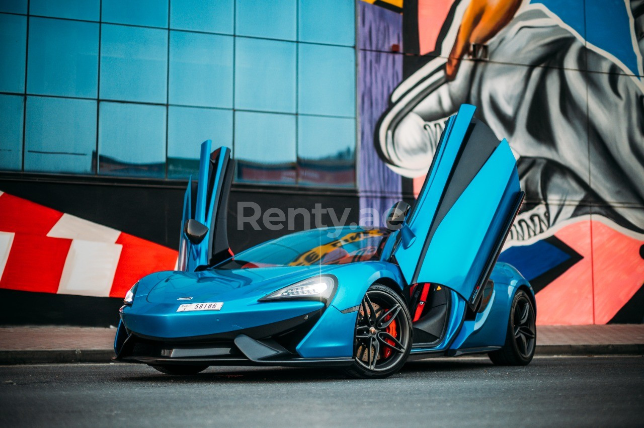 Blue McLaren 570S Spyder for rent in Sharjah 8