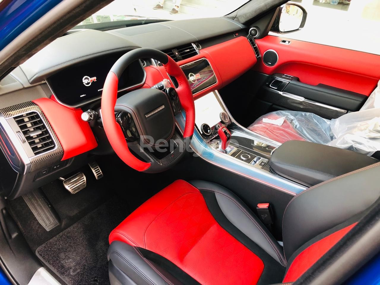 Blue Range Rover Sport SVR for rent in Dubai 2