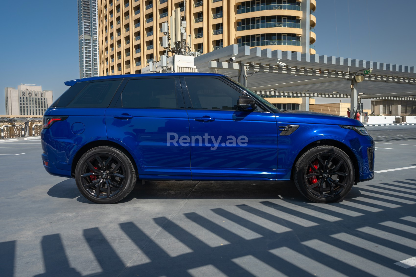 Blue Range Rover Sport SVR for rent in Dubai 1