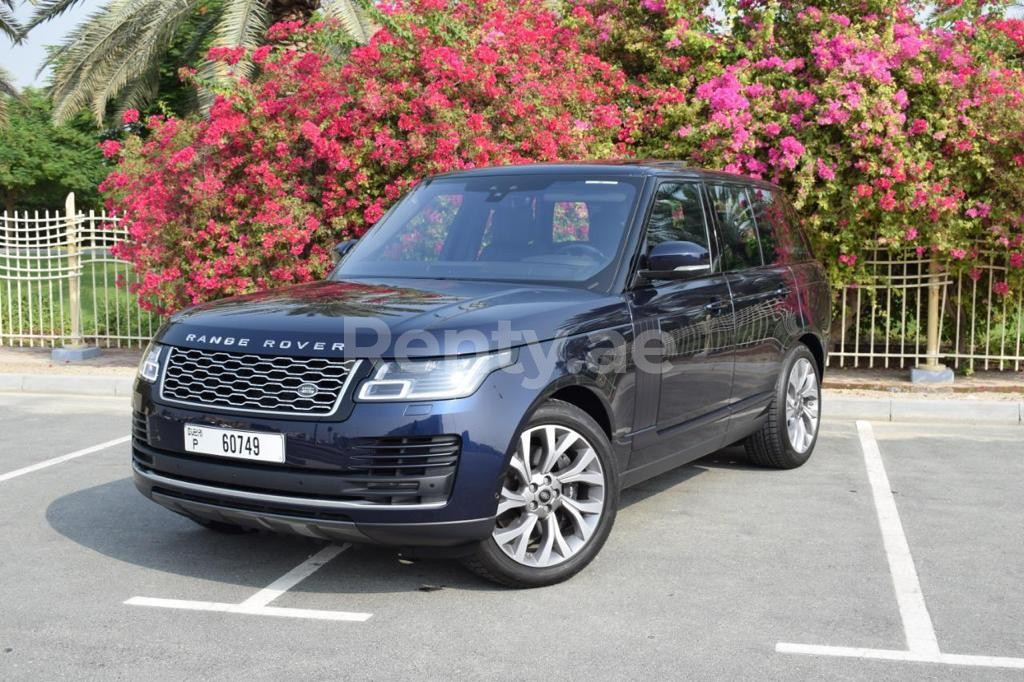 Blue Range Rover Vogue for rent in Dubai 1