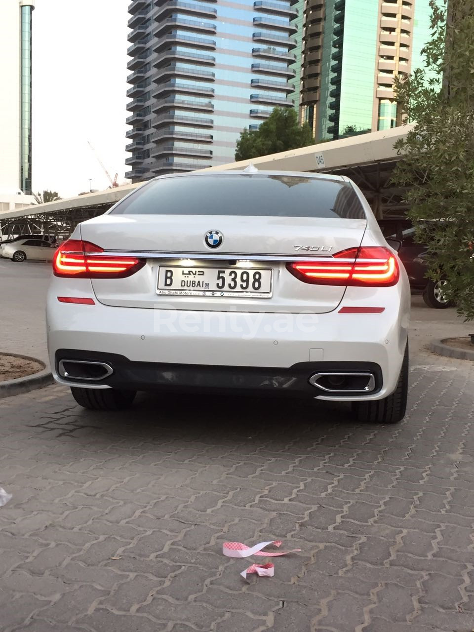 Bright White BMW 7 Series for rent in Sharjah 0