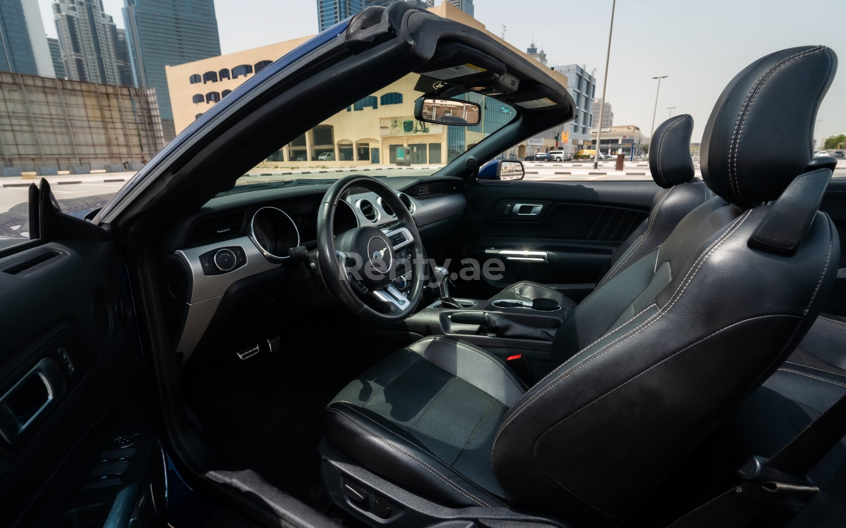 Dark Blue Ford Mustang cabrio for rent in Abu-Dhabi 3