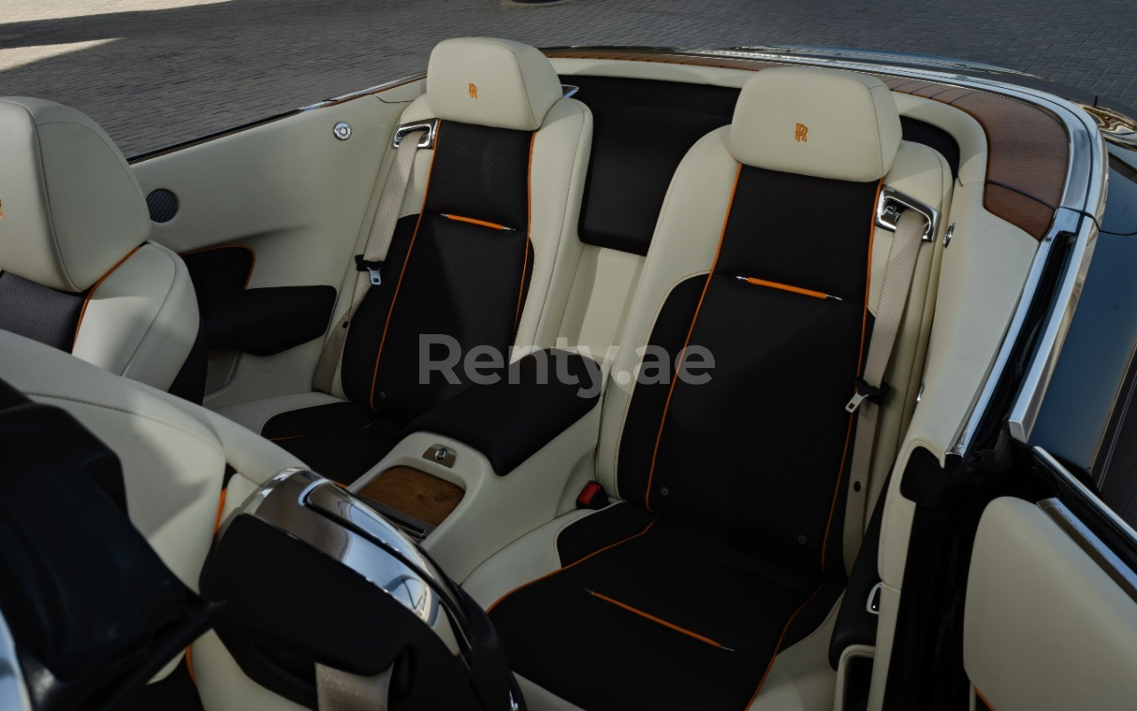 Dark Brown Rolls Royce Dawn for rent in Sharjah 4