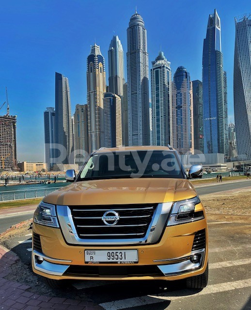 Gold Nissan Patrol V6 for rent in Abu-Dhabi 0