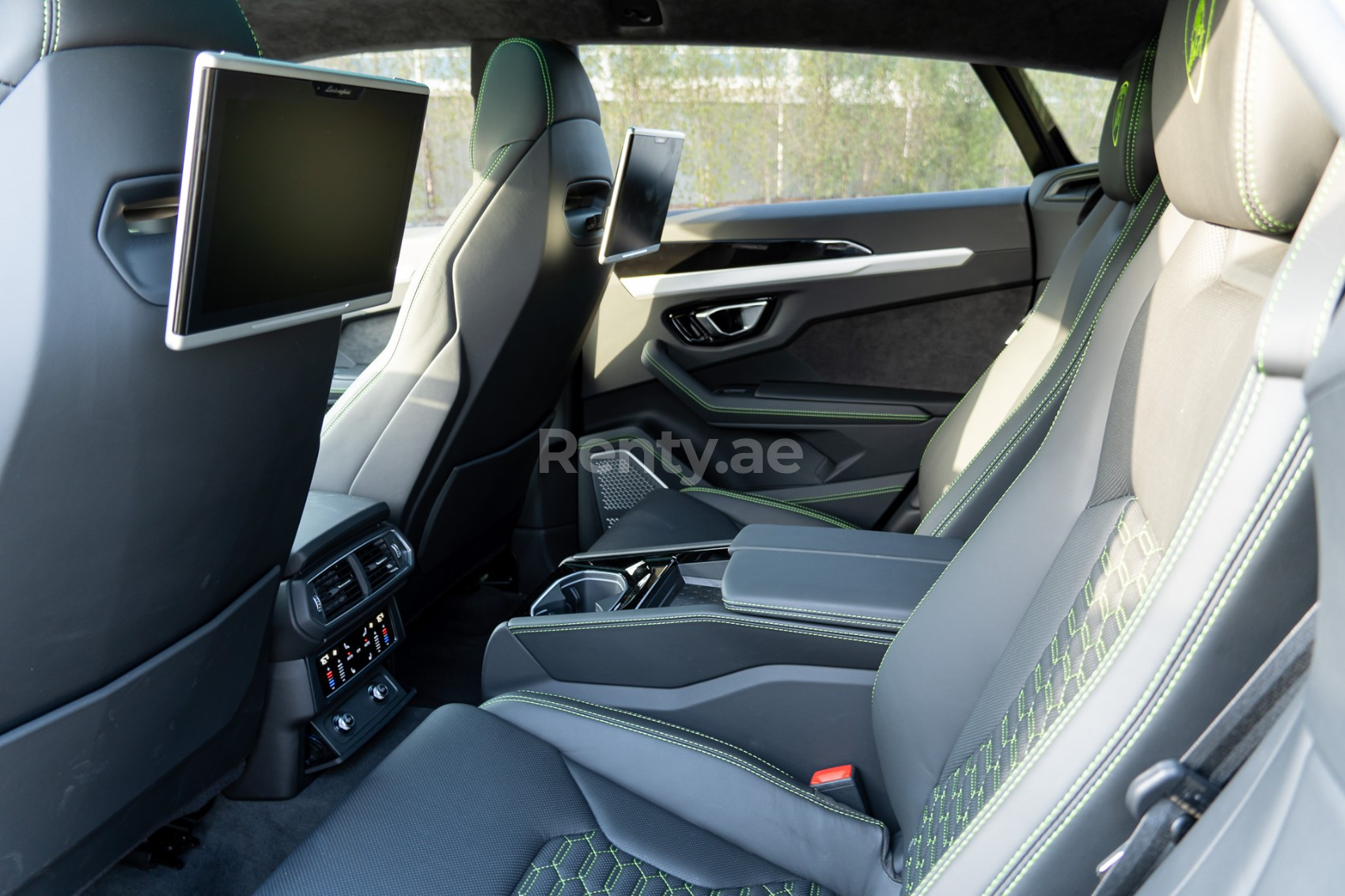 Green Lamborghini Urus for rent in Sharjah 3