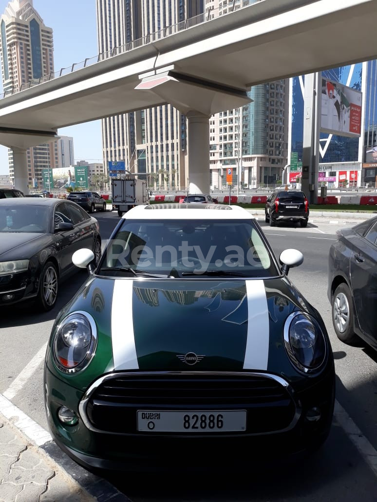 Green Mini Cooper for rent in Sharjah 4