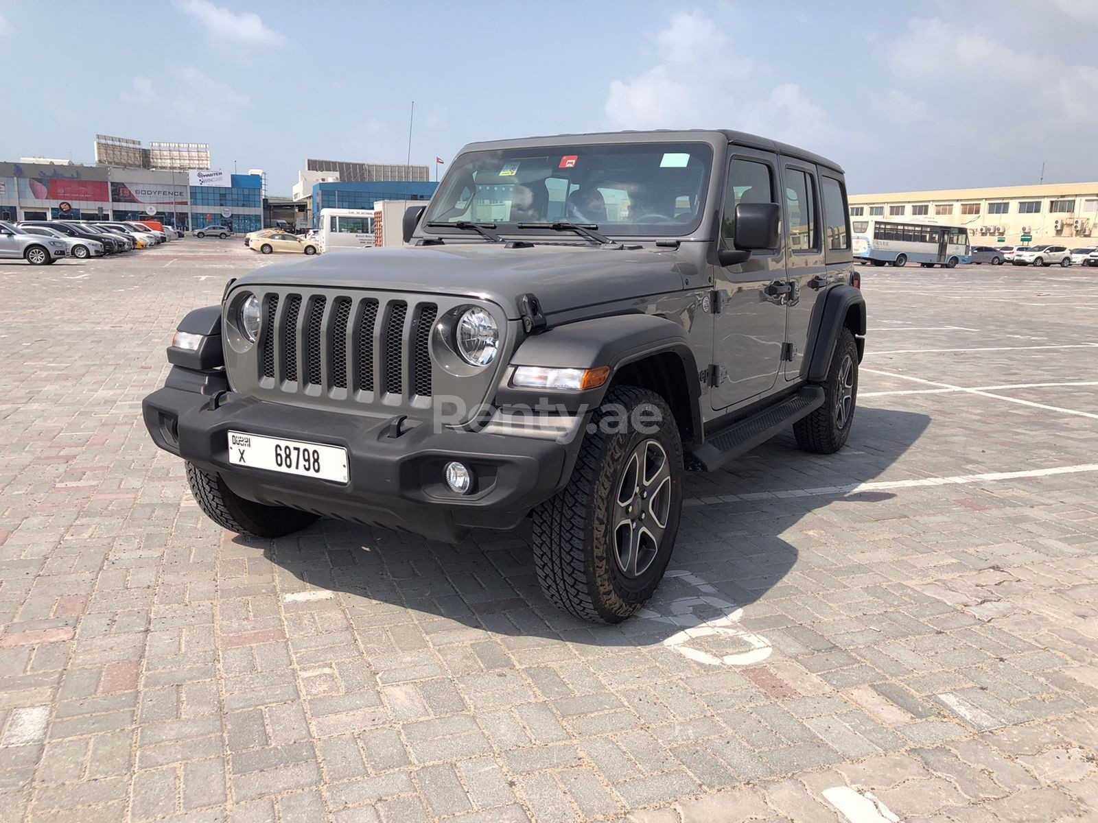 Grey Jeep Wrangler Unlimited Sports for rent in Sharjah 10