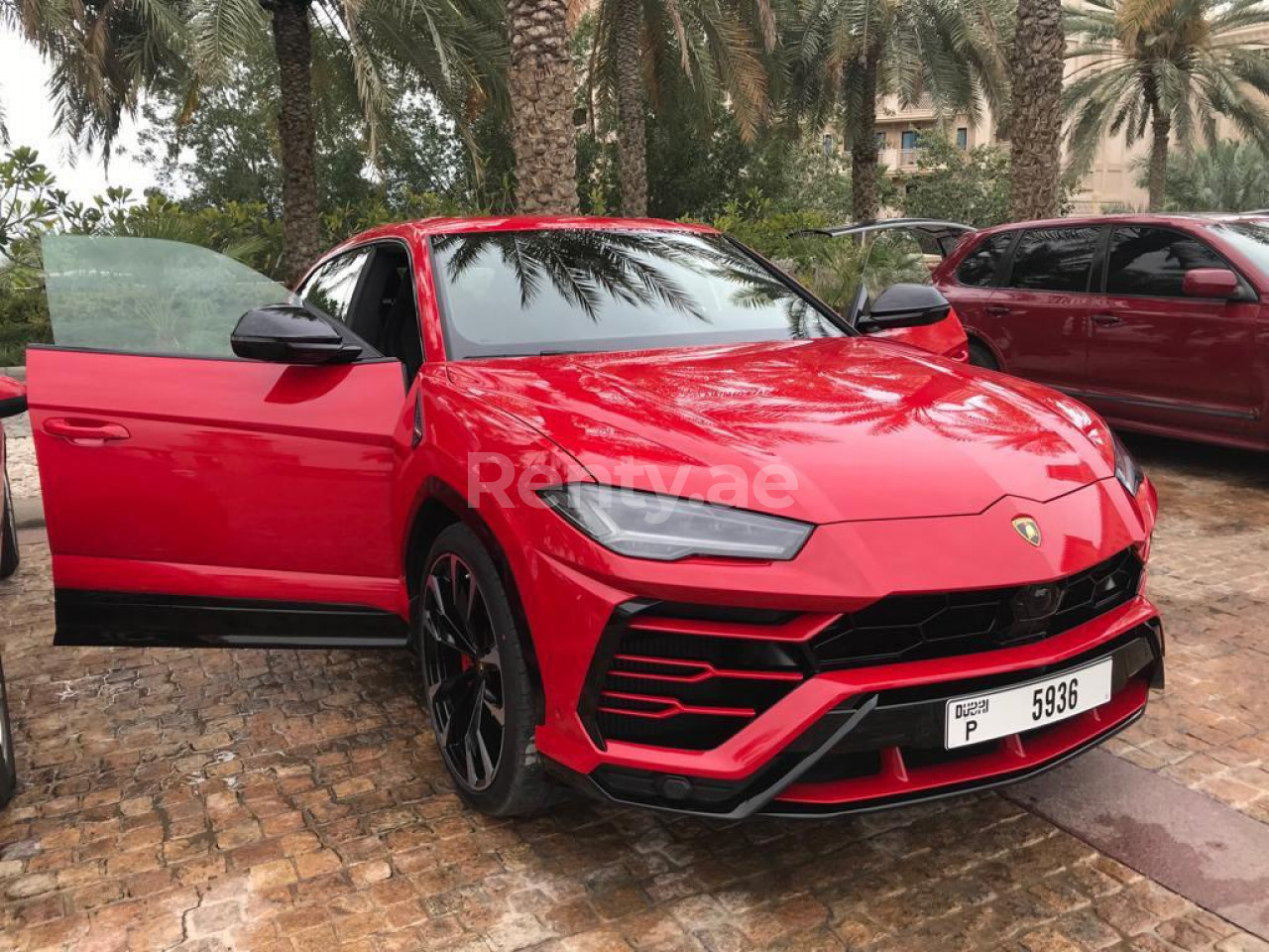 Red Lamborghini Urus for rent in Sharjah 3