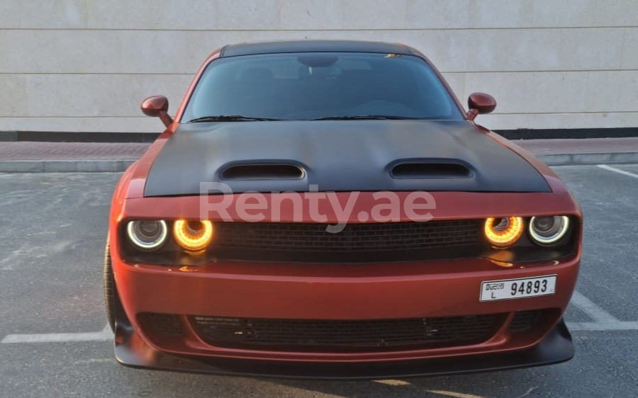 Orange Dodge Challenger for rent in Sharjah