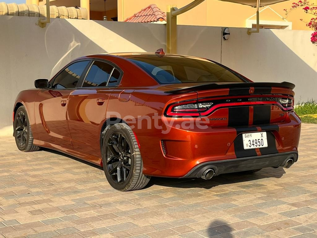 Orange Dodge Charger v8 SRT KIT for rent in Sharjah 1