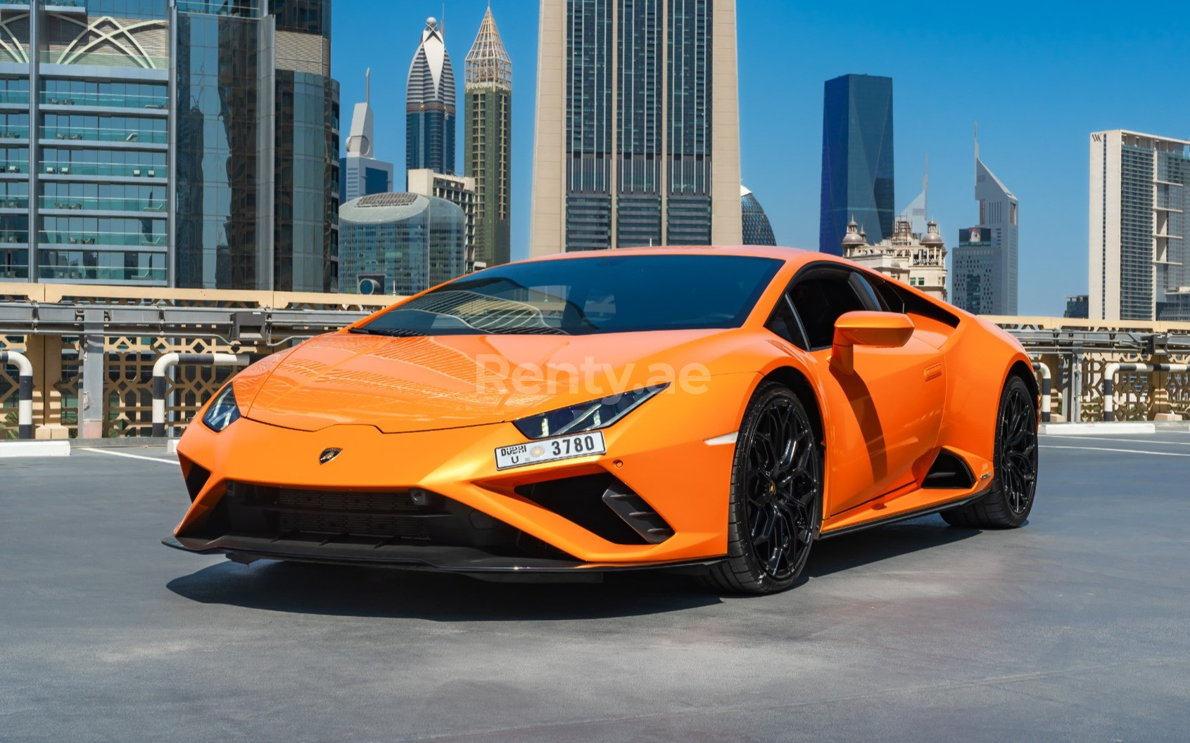 Orange Lamborghini Huracan for rent in Sharjah