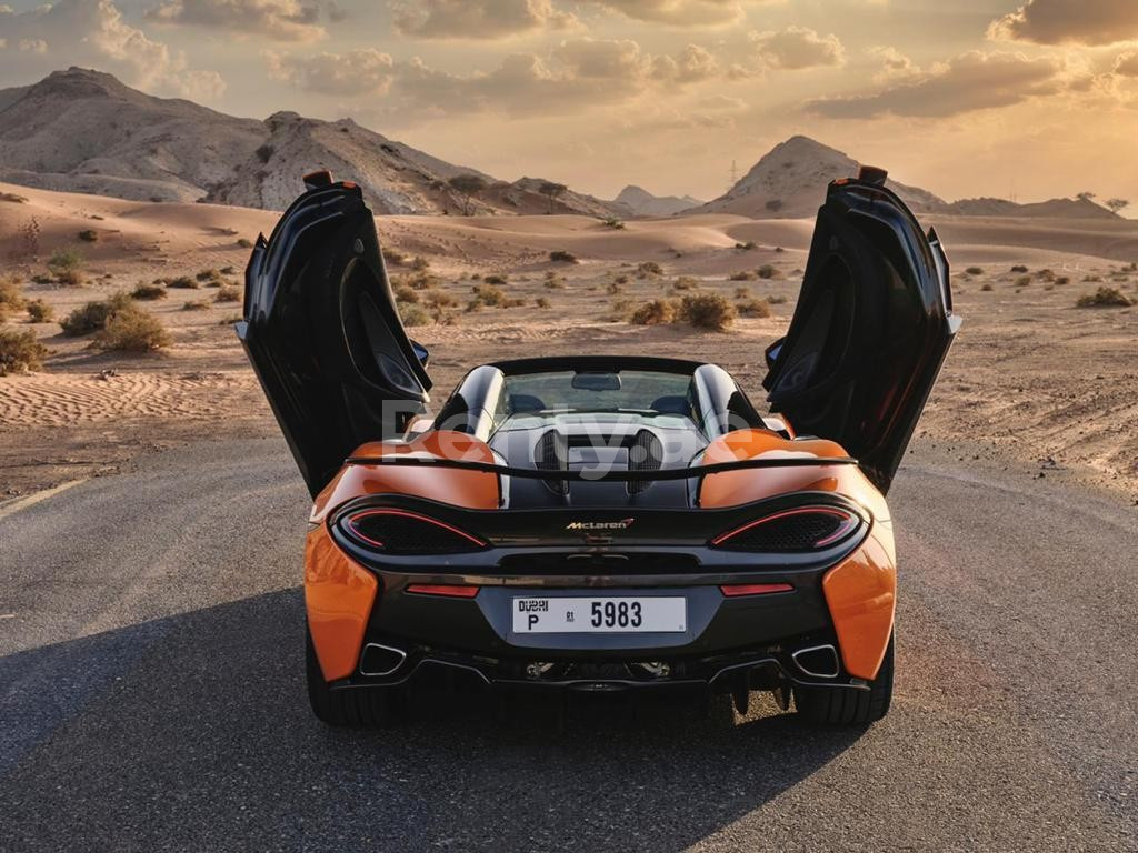 Orange McLaren 570S Spyder for rent in Dubai 2