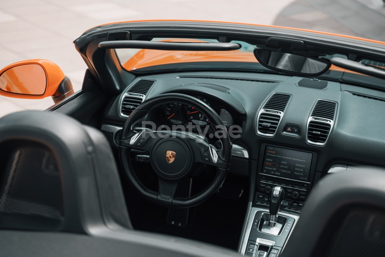 Orange Porsche Boxster for rent in Dubai 5