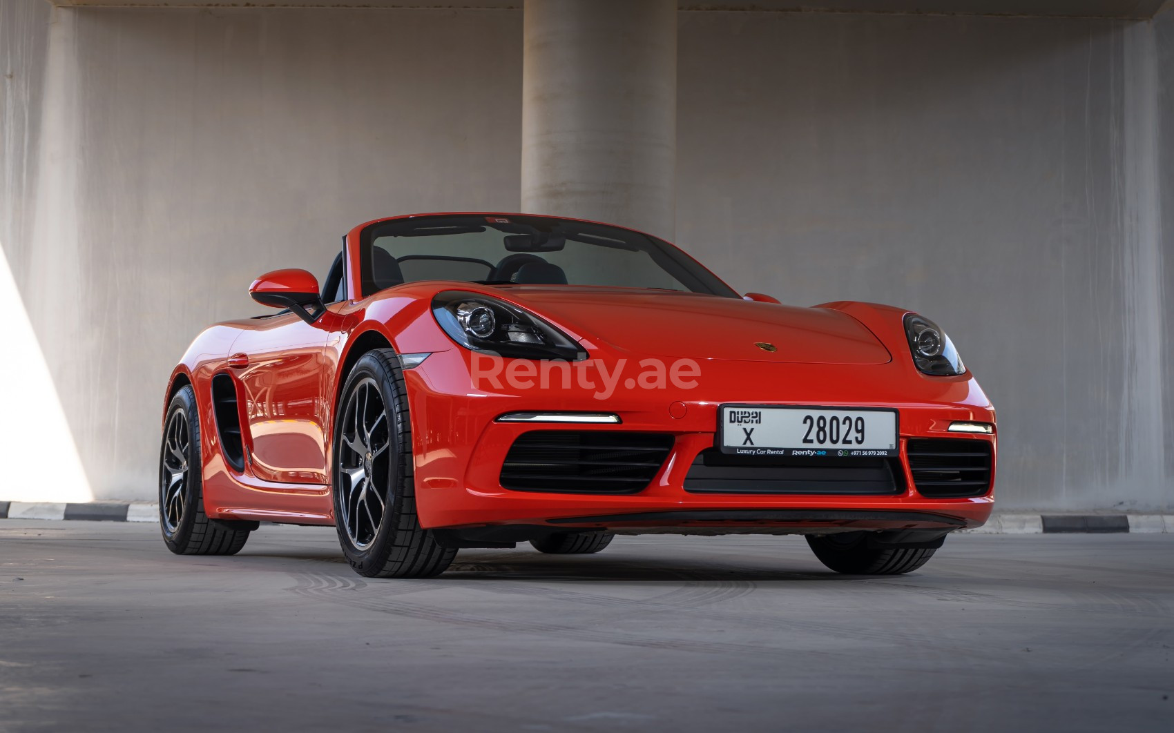 Orange Porsche Boxster 718 for rent in Abu-Dhabi 1