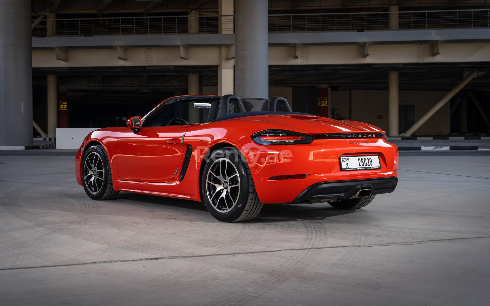 Orange Porsche Boxster 718 for rent in Dubai 3