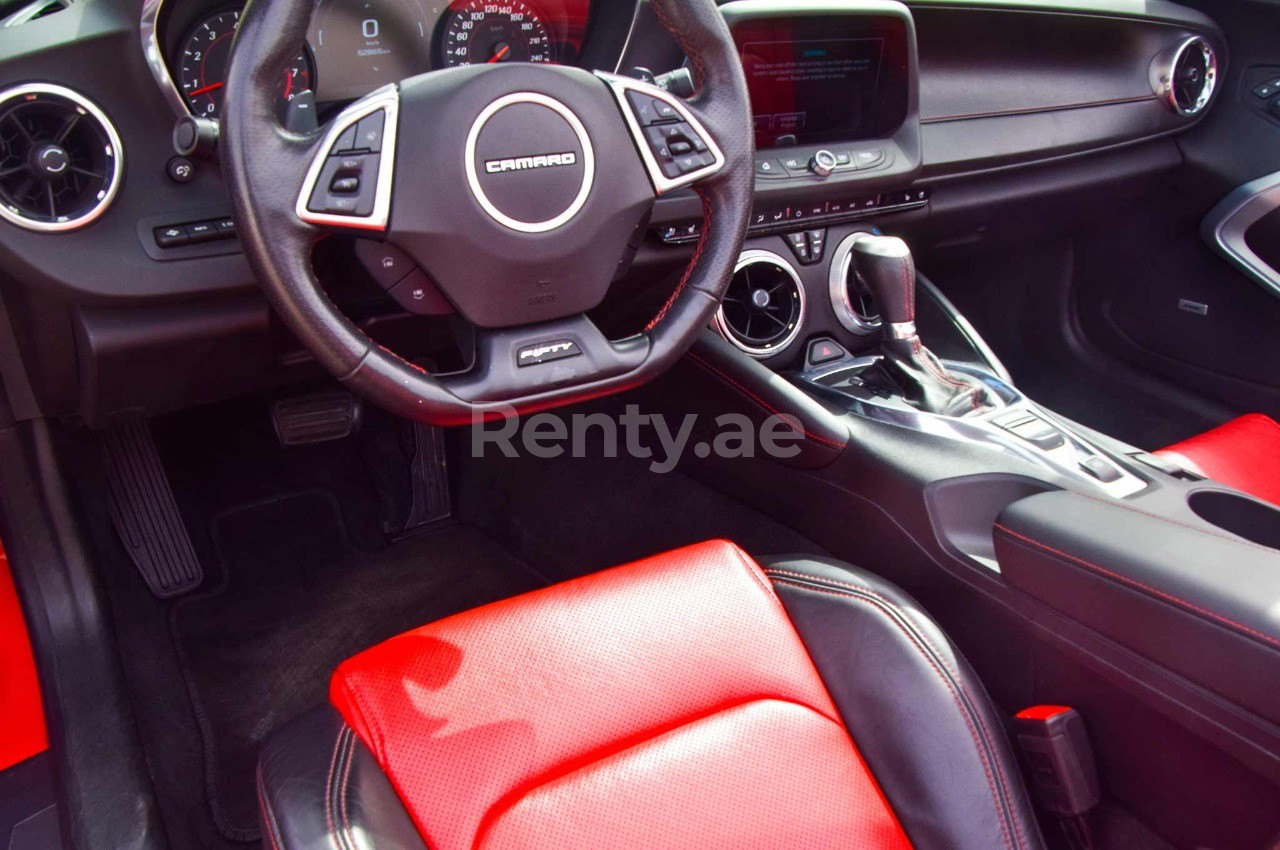 Red Chevrolet Camaro cabrio for rent in Sharjah 5