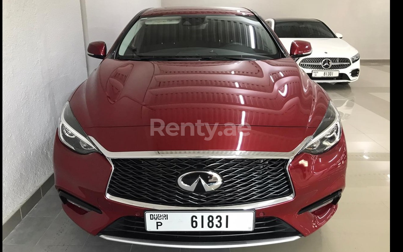 Red Infiniti Q30 for rent in Dubai