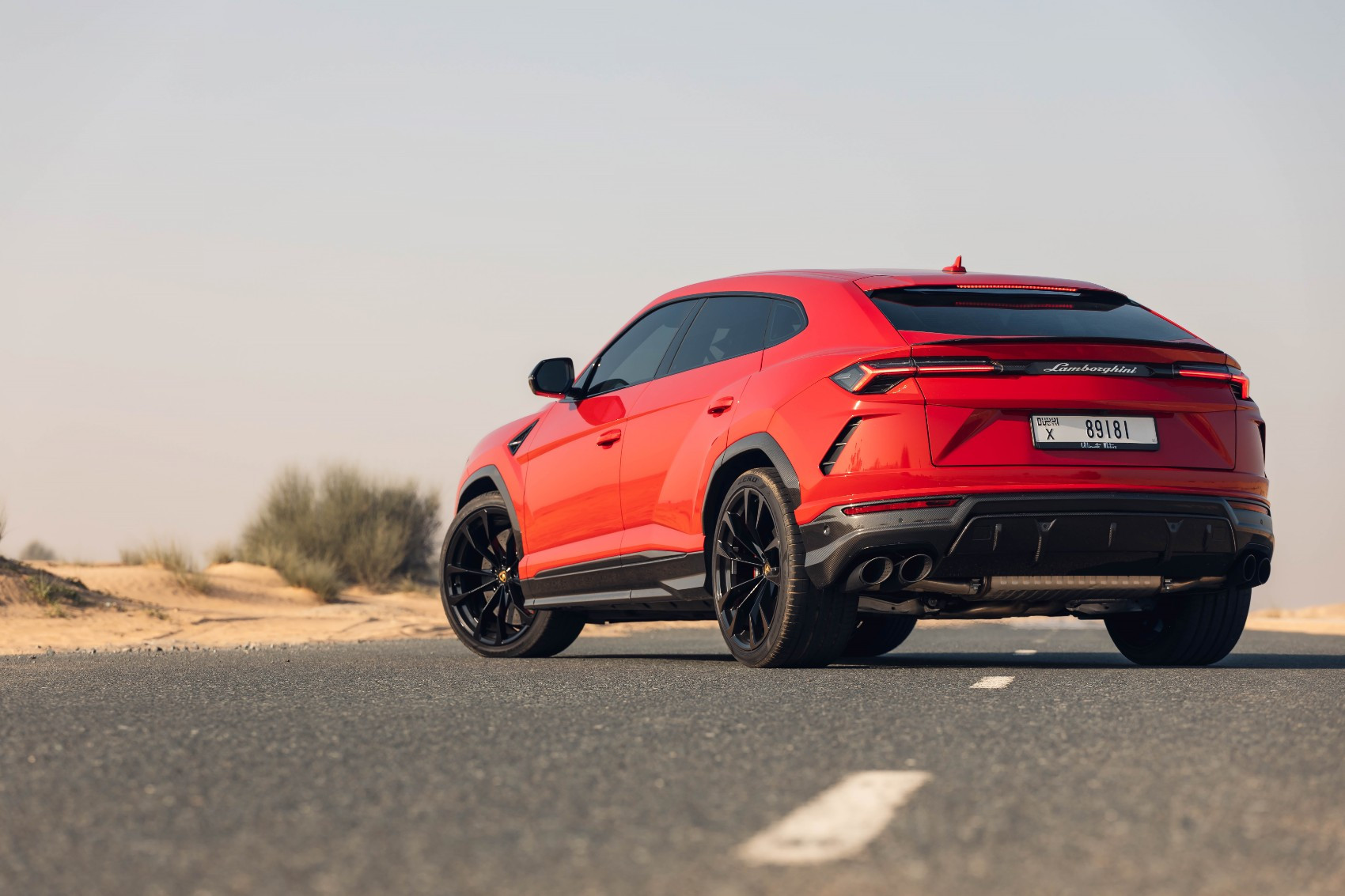 Red Lamborghini Urus for rent in Dubai 1