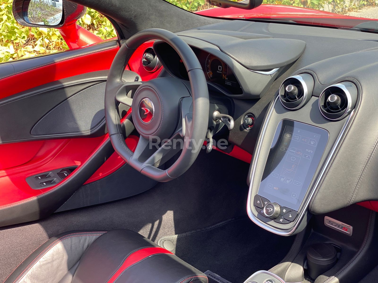 Red McLaren 570S Spyder for rent in Dubai 2