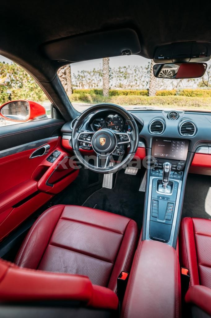 Red Porsche Cayman GTS for rent in Dubai 2