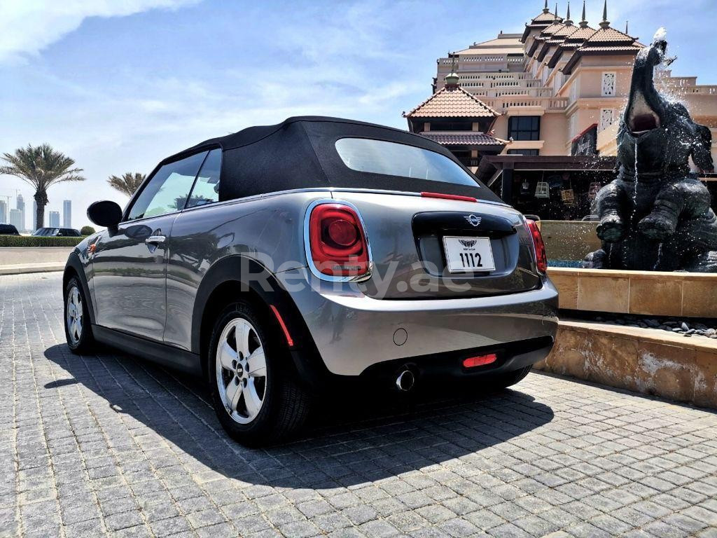 Silver Mini Cooper cabrio for rent in Dubai 5