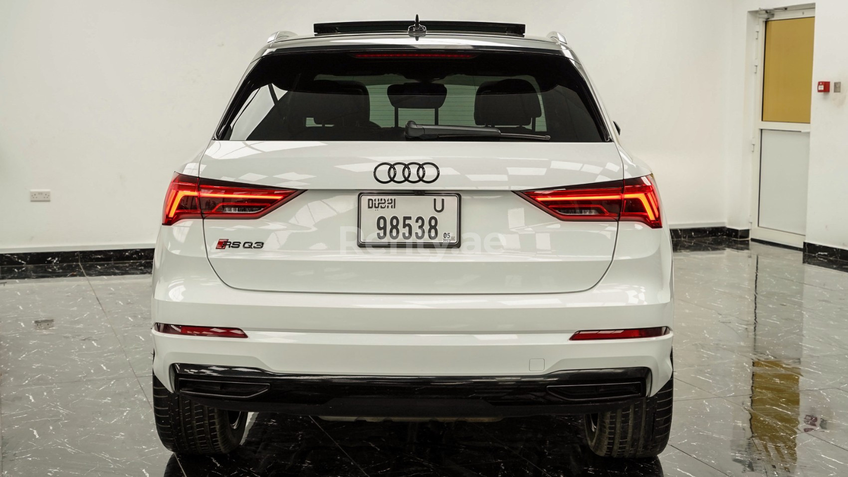 White Gray 2021 Audi Q3 with RS3 bodykit for rent in Dubai 3