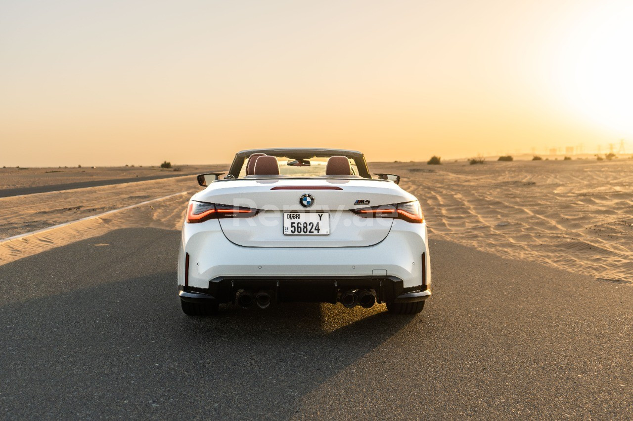 White 2021 BMW 430i M4 bodykit upgraded exhaust system for rent in Dubai 3