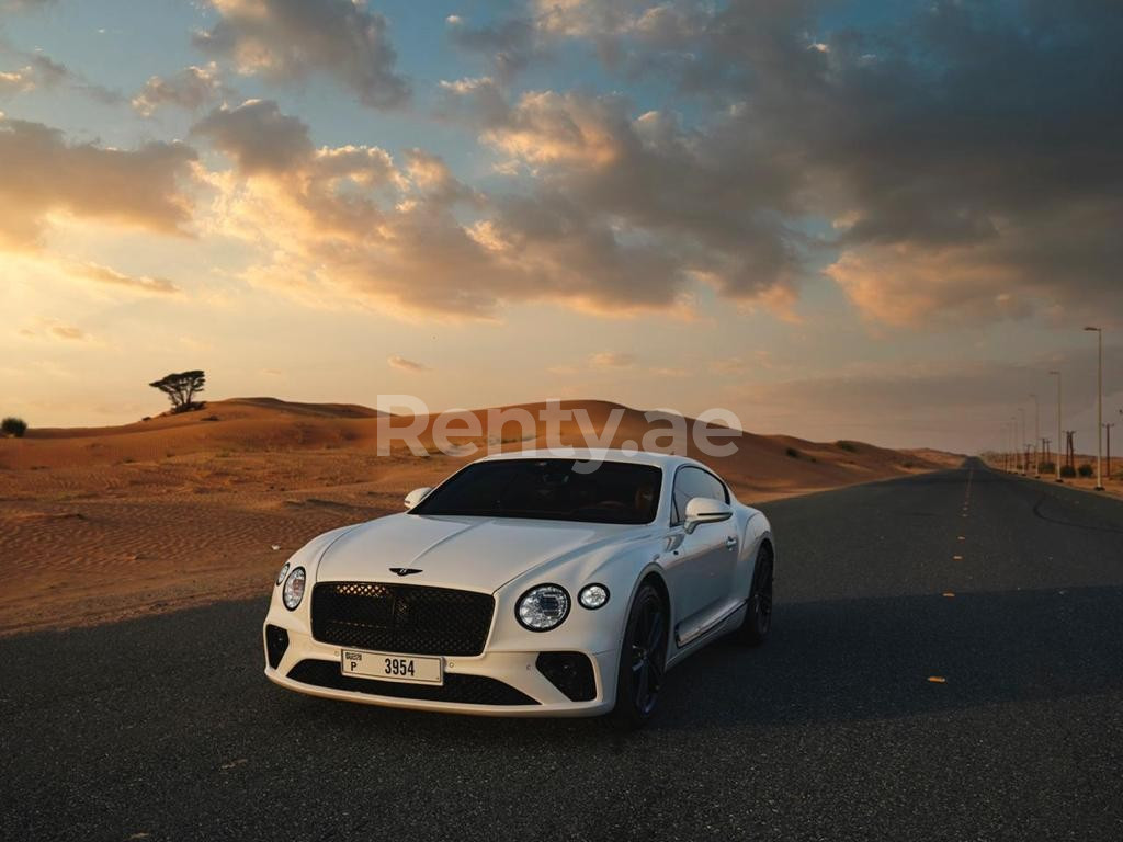 Blanc Bentley Continental GT en location à Abu-Dhabi 2