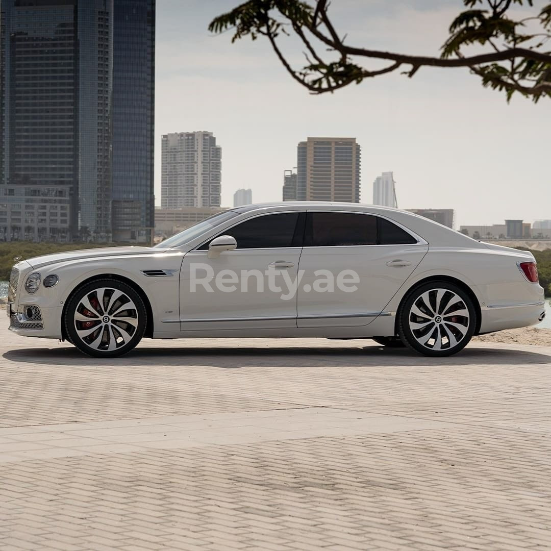 White Bentley Flying Spur for rent in Abu-Dhabi 0