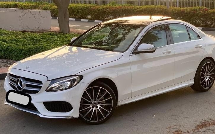 White Mercedes C300 Class for rent in Abu-Dhabi