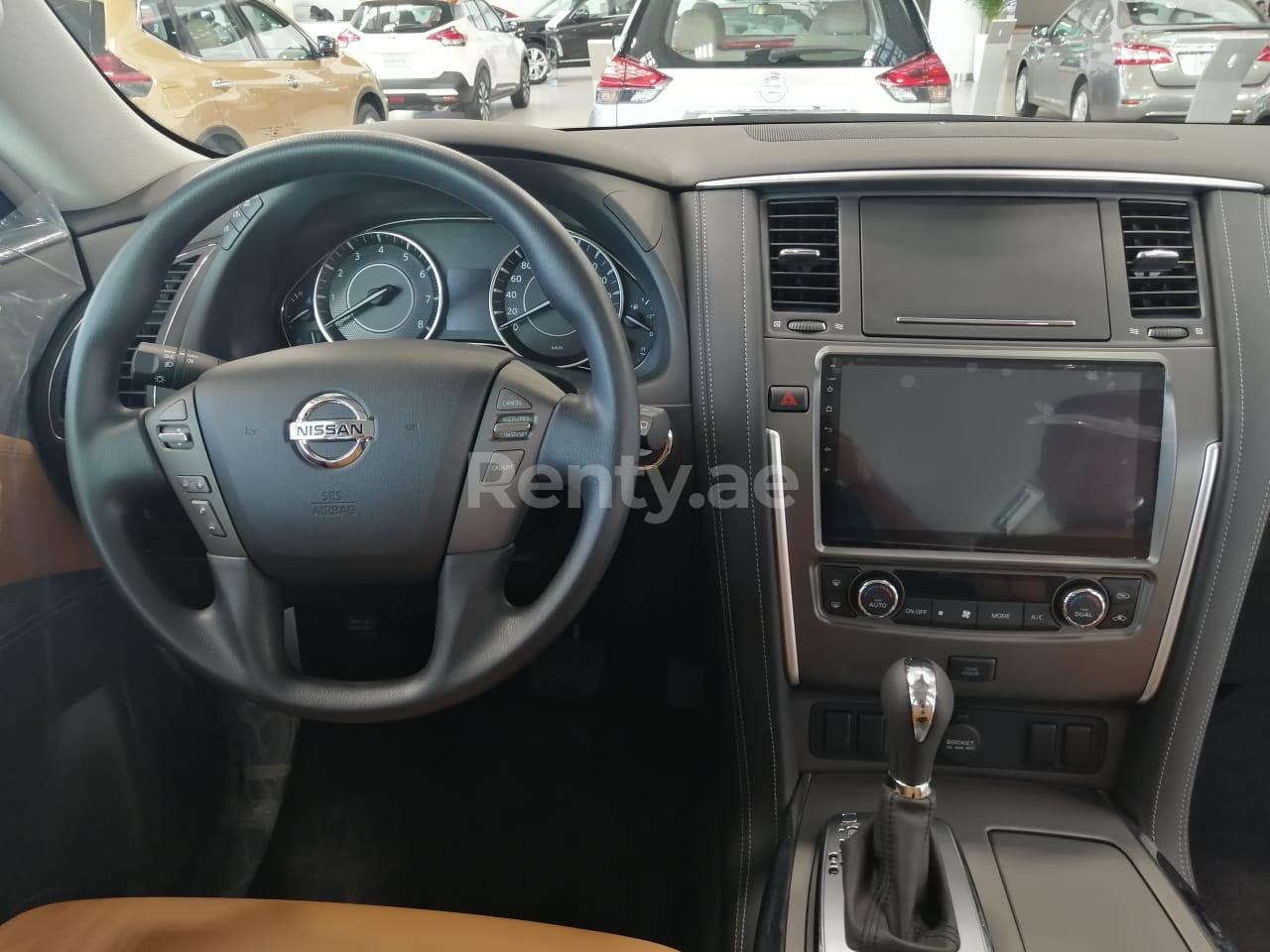 White Nissan Patrol XE for rent in Dubai 2